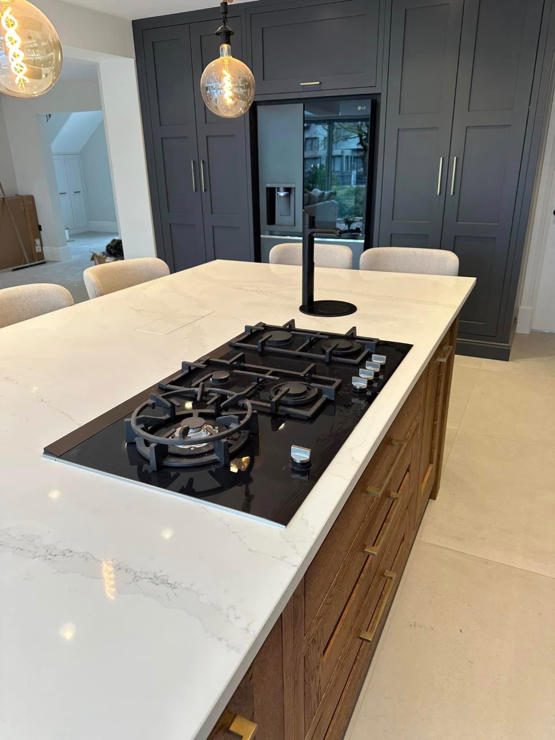 Marble kitchen island with gas hob